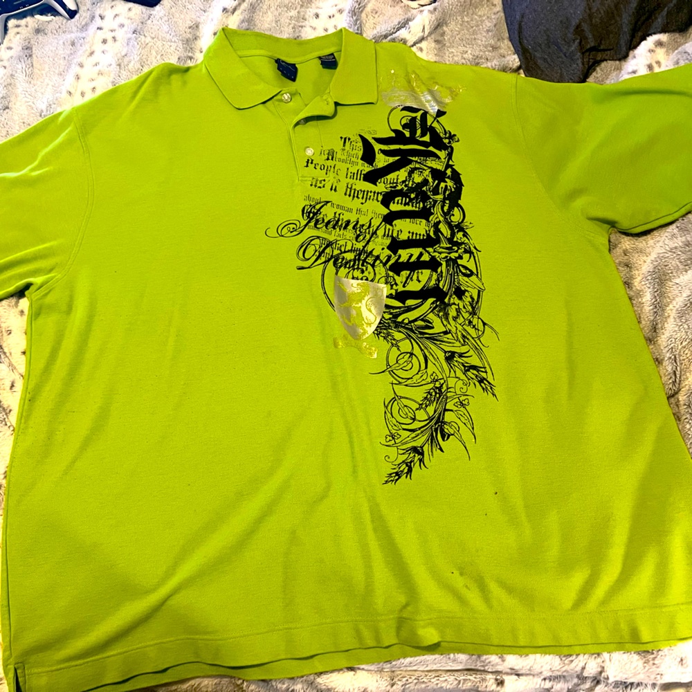 Mens Polo shirt- some wear showing on back shoulder and and below the graphic